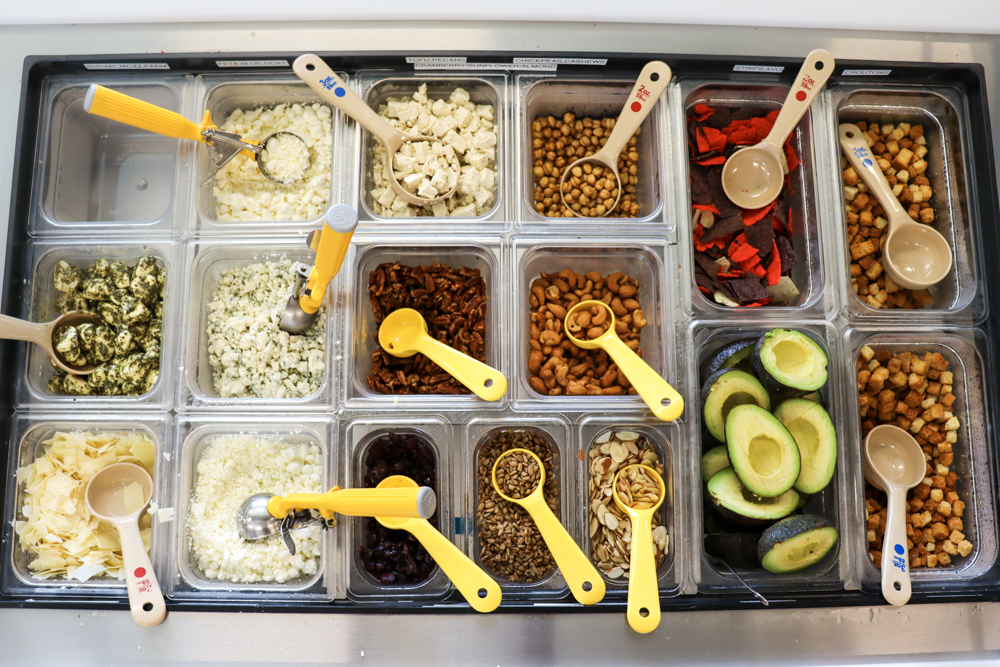Menu Content Photography GREENLANE Salad bar display with rainbow toppings
