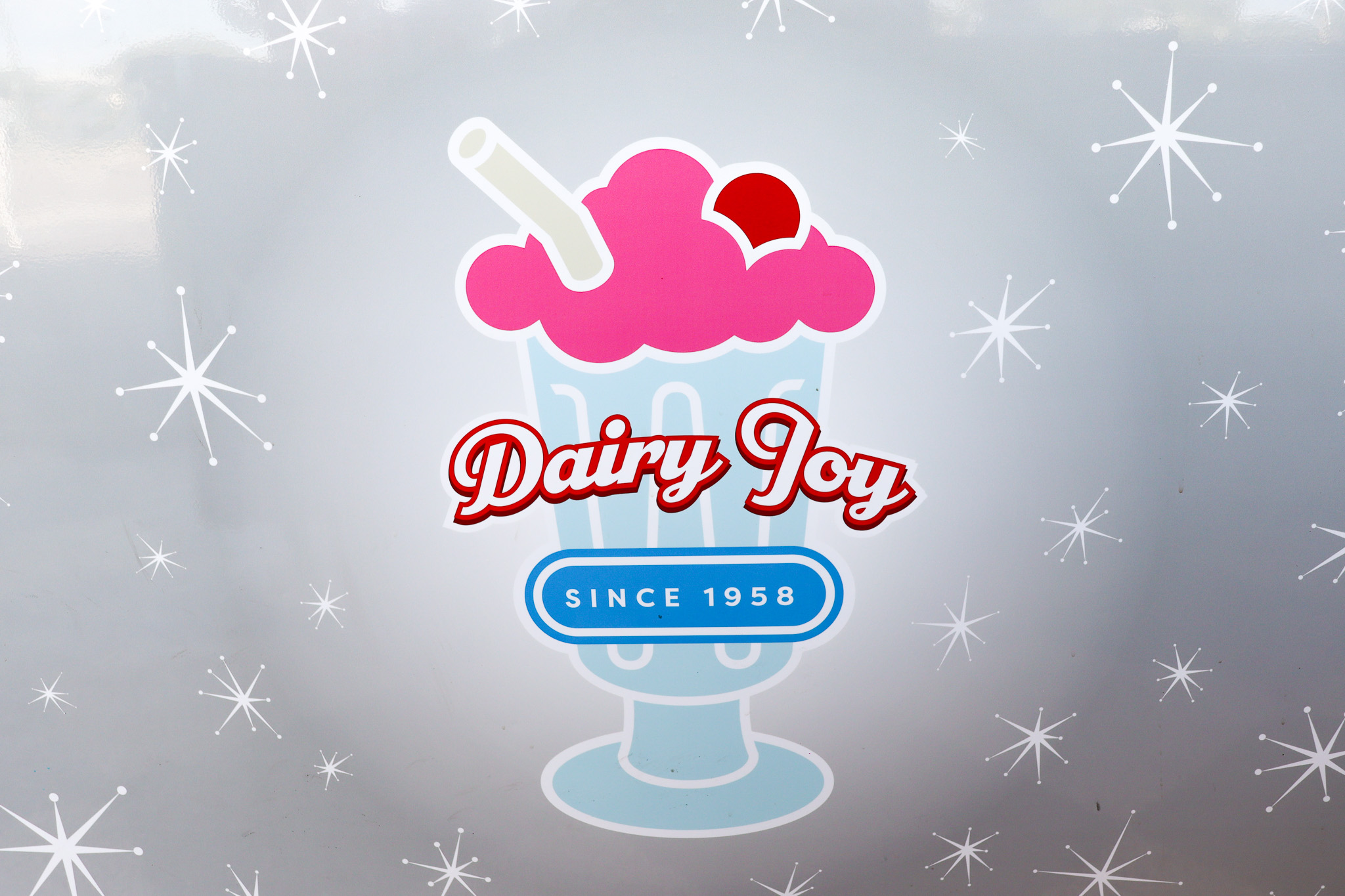 Dairy Joy Logo Branding Image Dairy Joy digital logo with sparkles