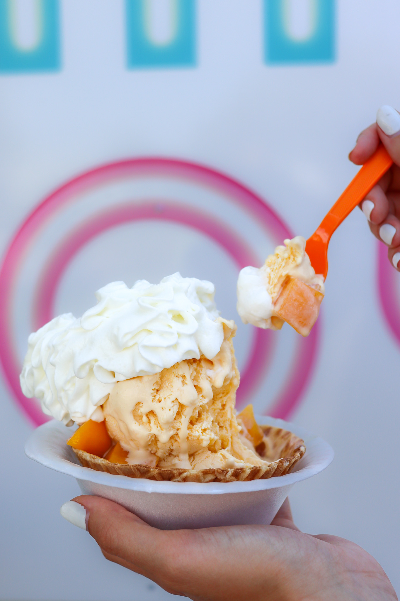 Caramel Sundae Dessert Photo Vanilla ice cream with caramel drizzle and waffle cookie