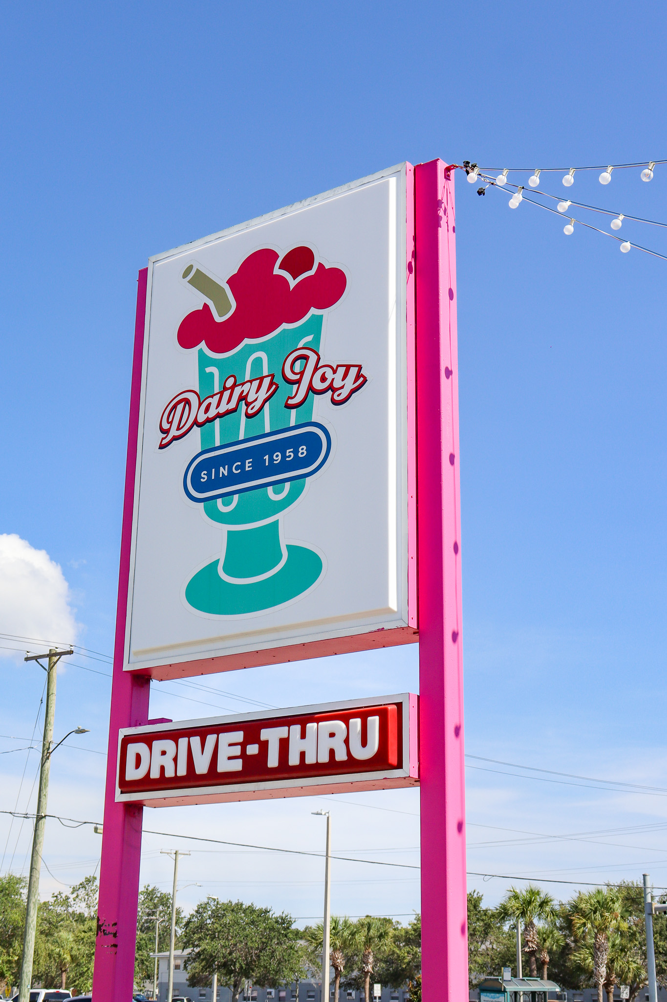 Dairy Joy Tampa Landmark Sign Dairy Joy vertical sign on blue sky