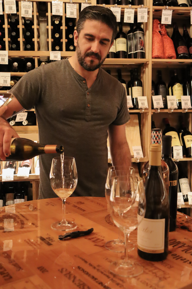 White Wine Pour Action – Lifestyle Photography Pouring white wine into glass