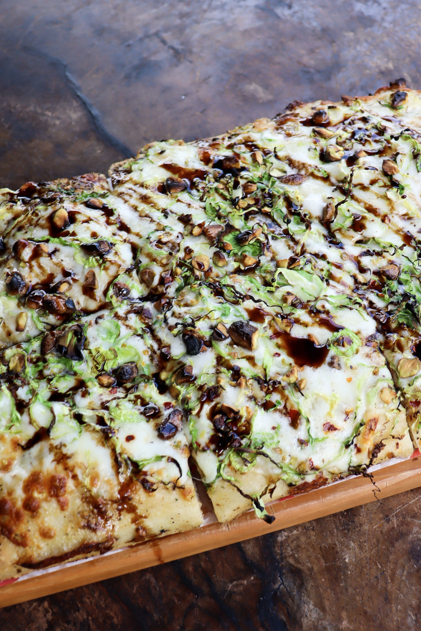Artisan Flatbread Photography Tampa Flatbread with balsamic glaze and microgreens